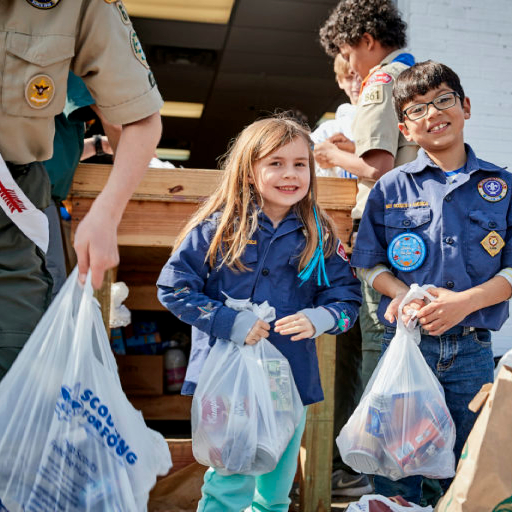 Scouting for Food October 28th - Nov 4th Cubs and Arrowman with bags of food