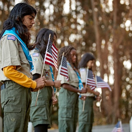 Vet. Flag Placement November 11th Reverent Scouts, BSA girls in Class A uniform holding flags